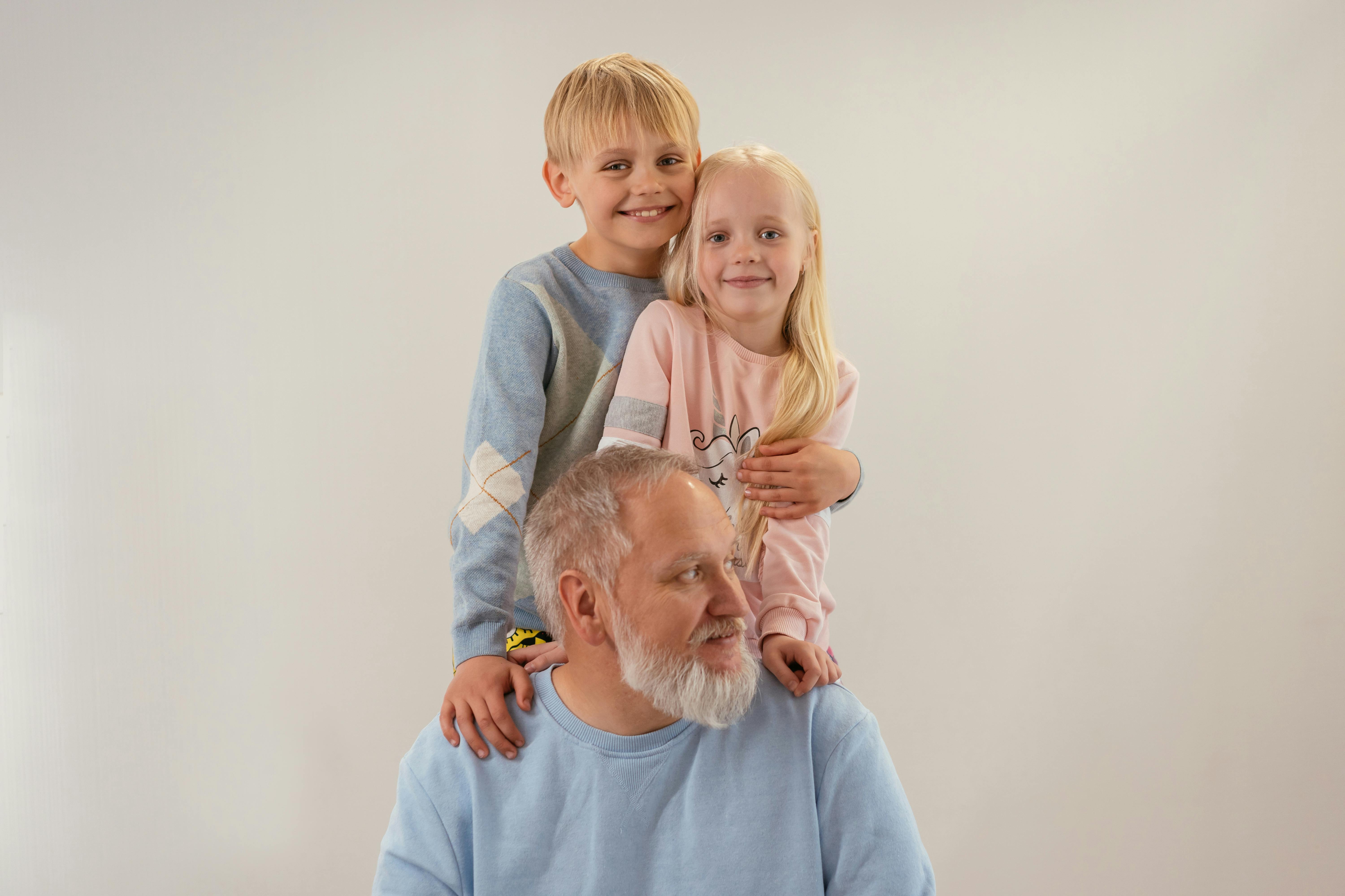 Family photo of Dad with his kids