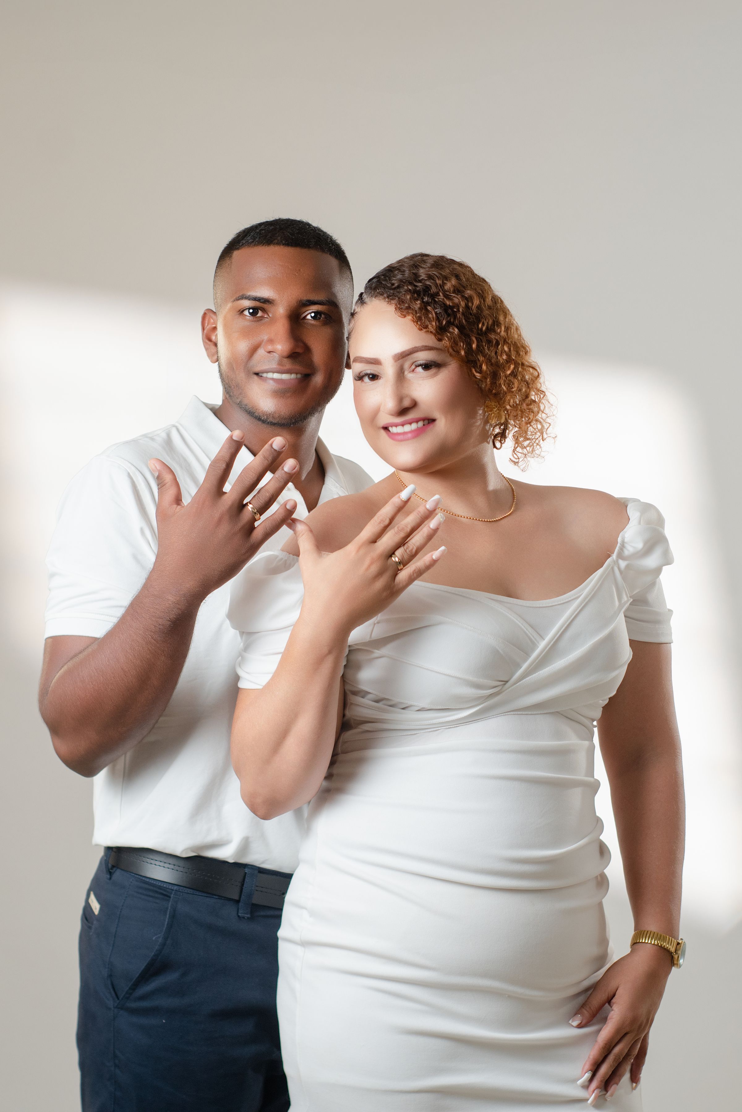 Engaged couple celebrating in elegant attire