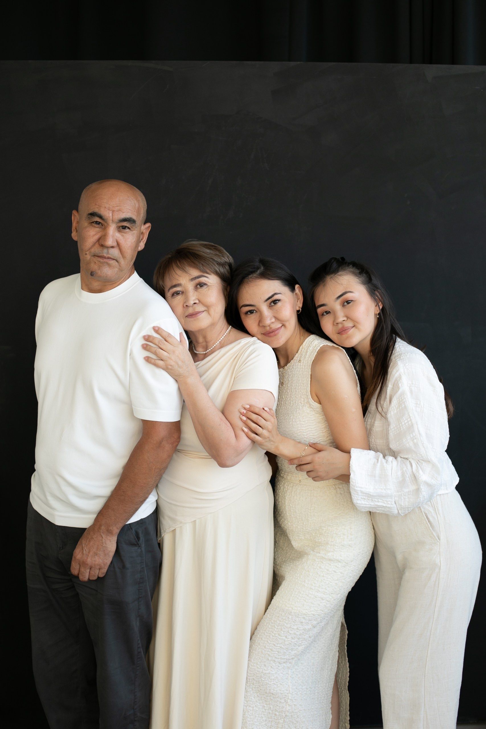 Multigenerational family portrait with four people