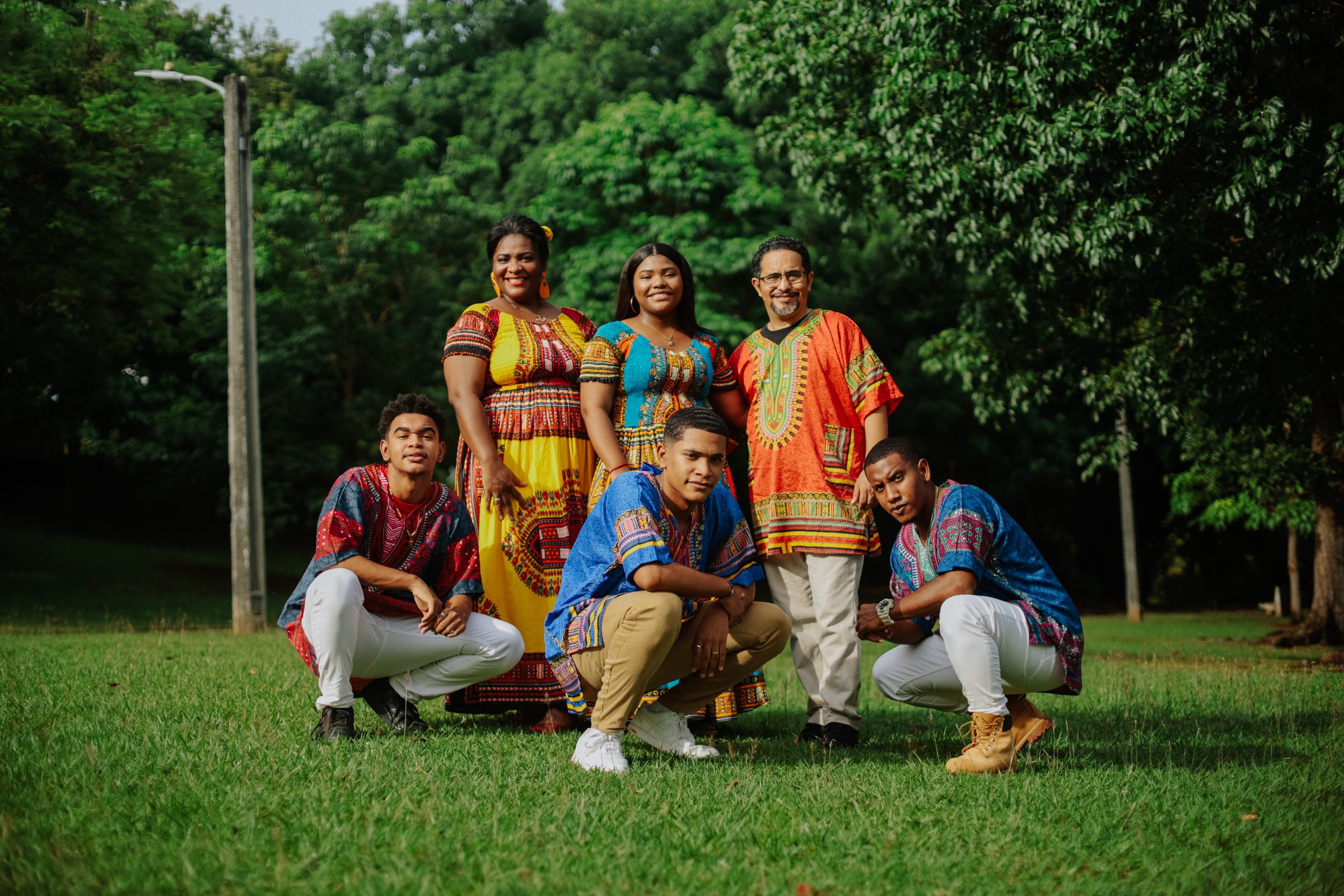 Large family group wearing traditional clothing