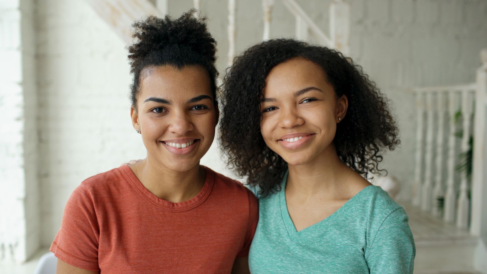 Original photo: mother and daughter smiling together at home