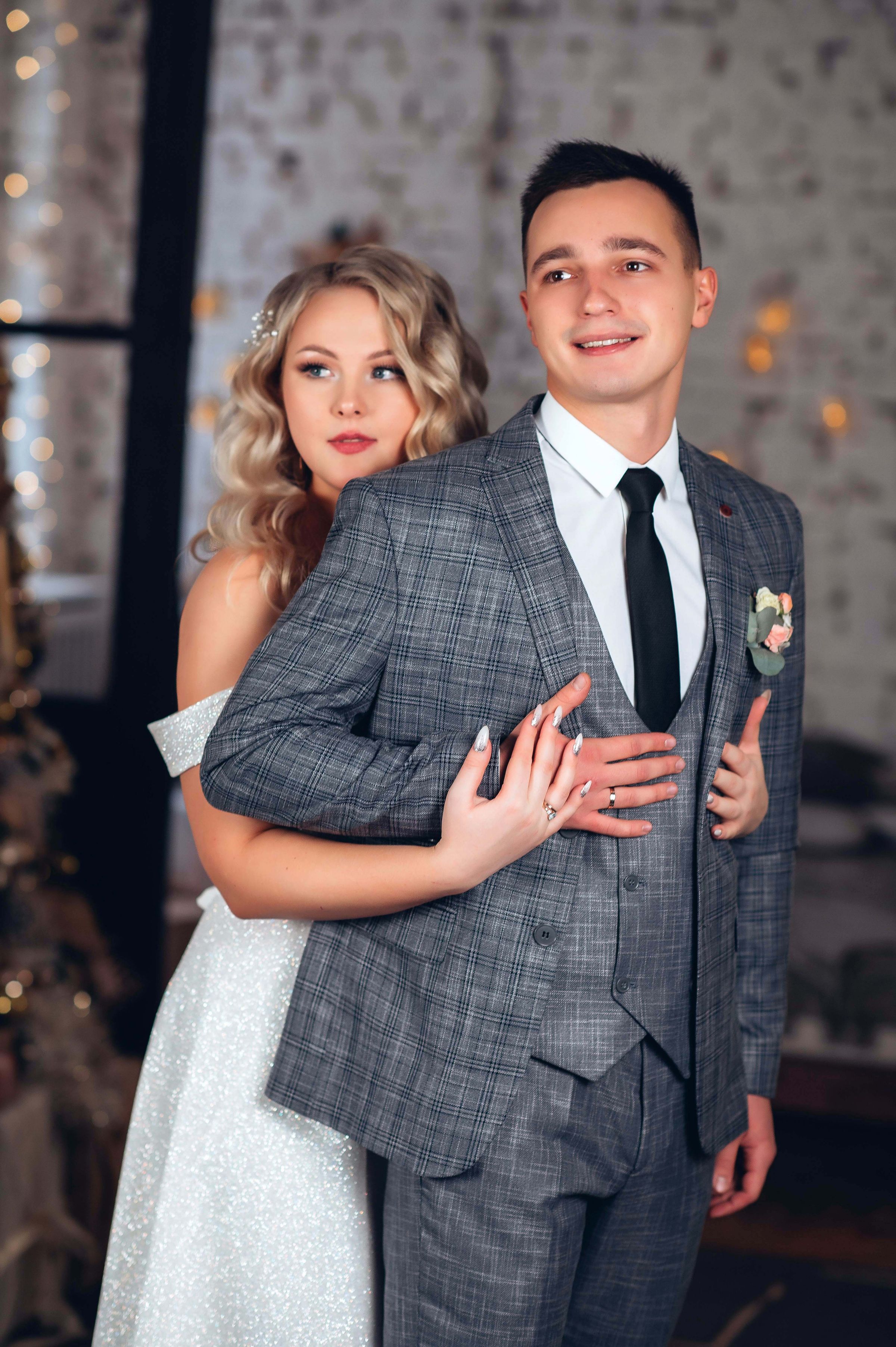 Newlywed couple in contemporary formalwear
